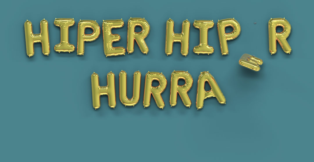 Scene med balloner som staver “Hiper Hiper Hurra”.